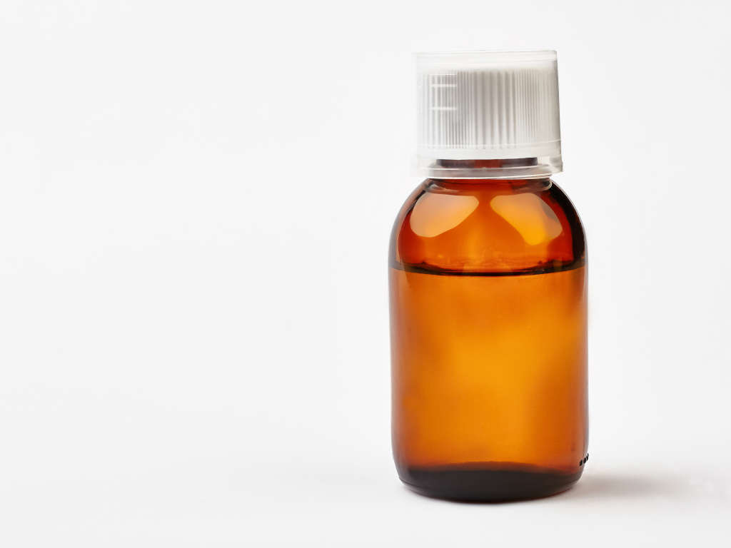 cough Syrup Bottle | Opioids | La Hacienda