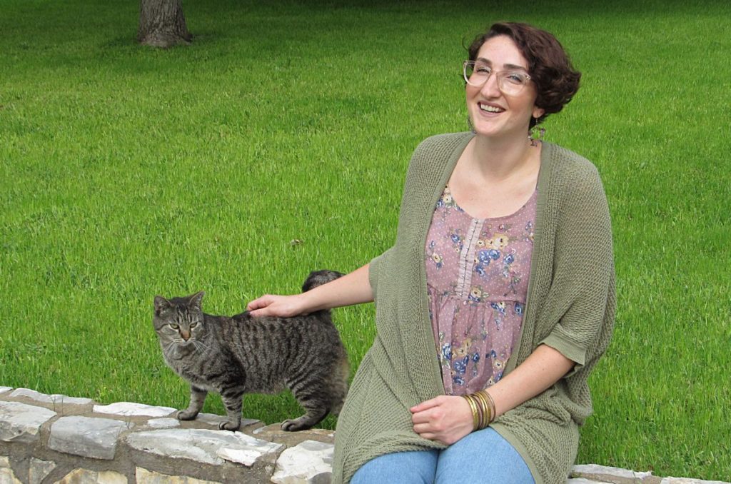 Intern program graduate Rachel Kessler and Rocky, her purr-fect patient.